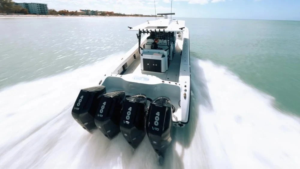 Powerboat seen from behind on open water