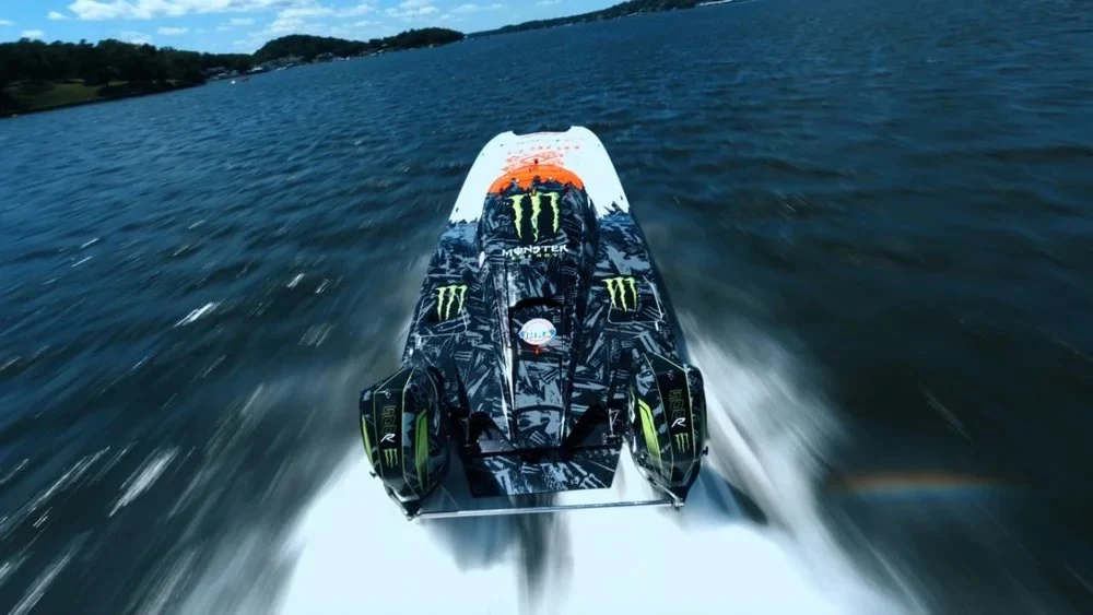 FPV shot of an offshore race boat cutting through open water